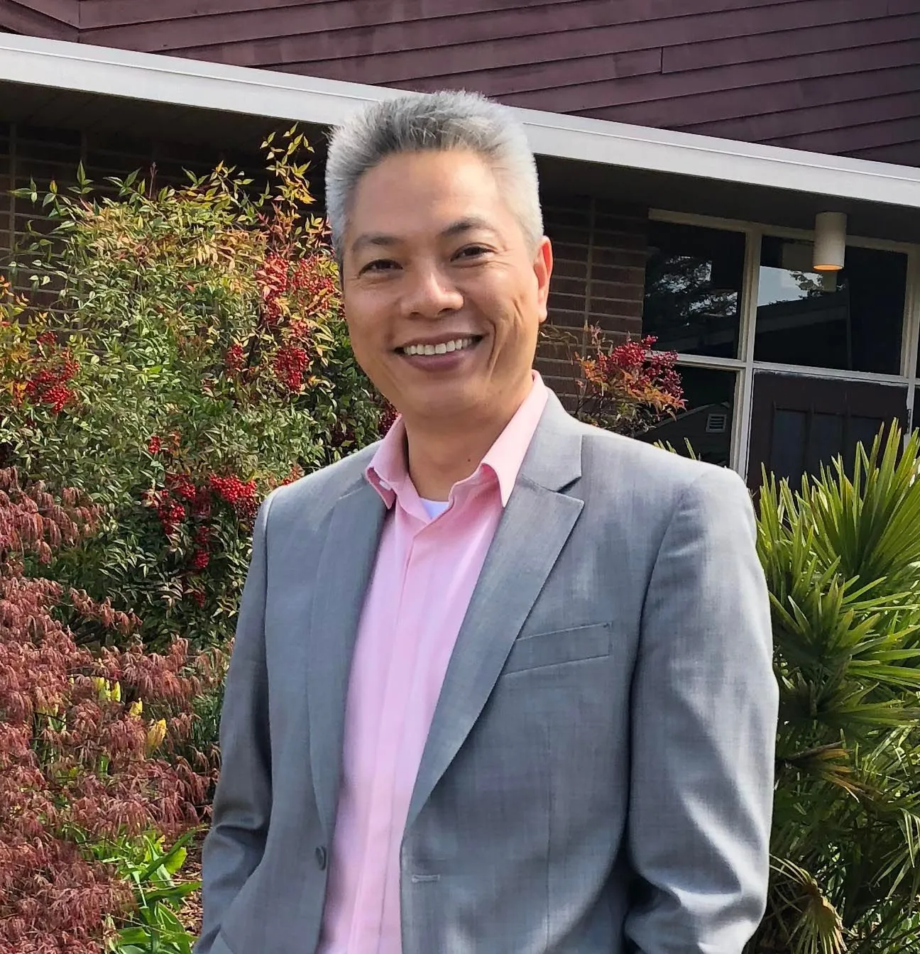 Jeff Thungc, Iu Mien Language Services co-founder, standing outdoors