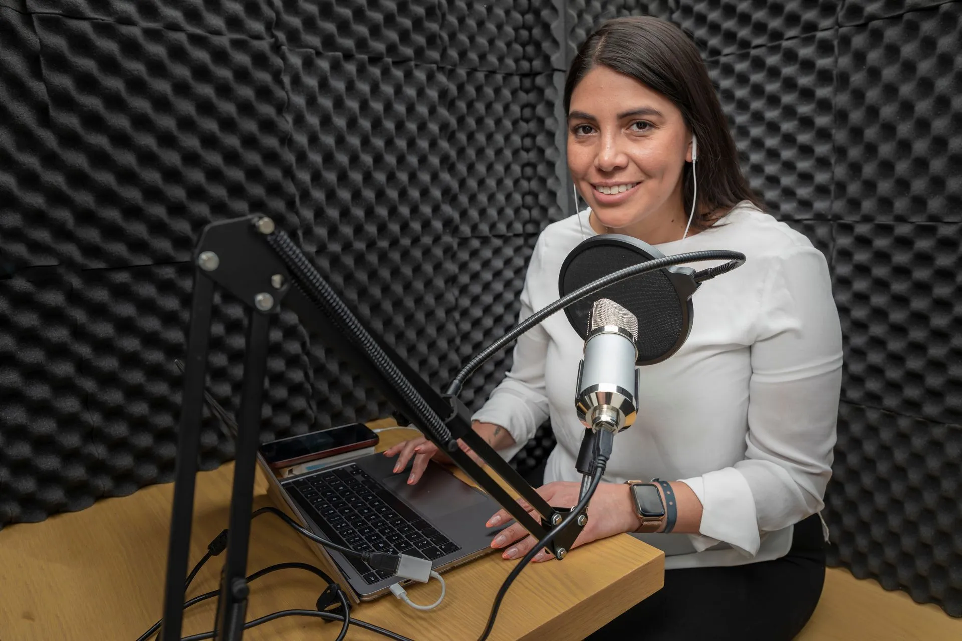 Audio recording professional producing culturally relevant voiceover media